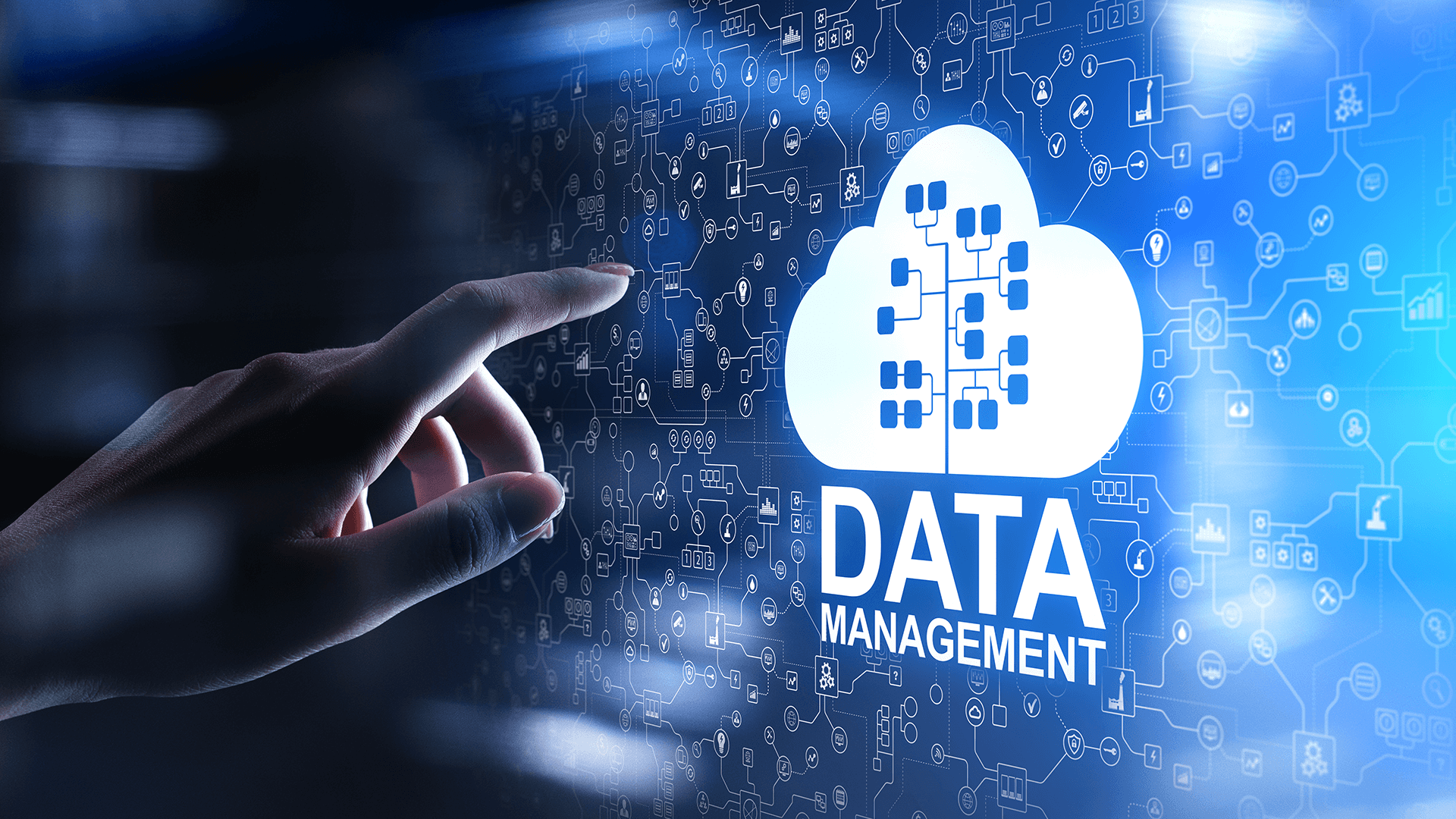 Person tapping cloud icon with the words data management below