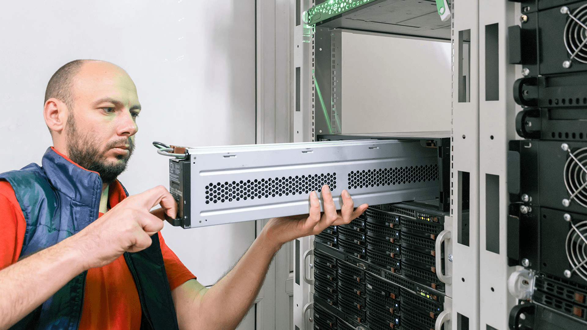 Technician Installing A New Ups Battery